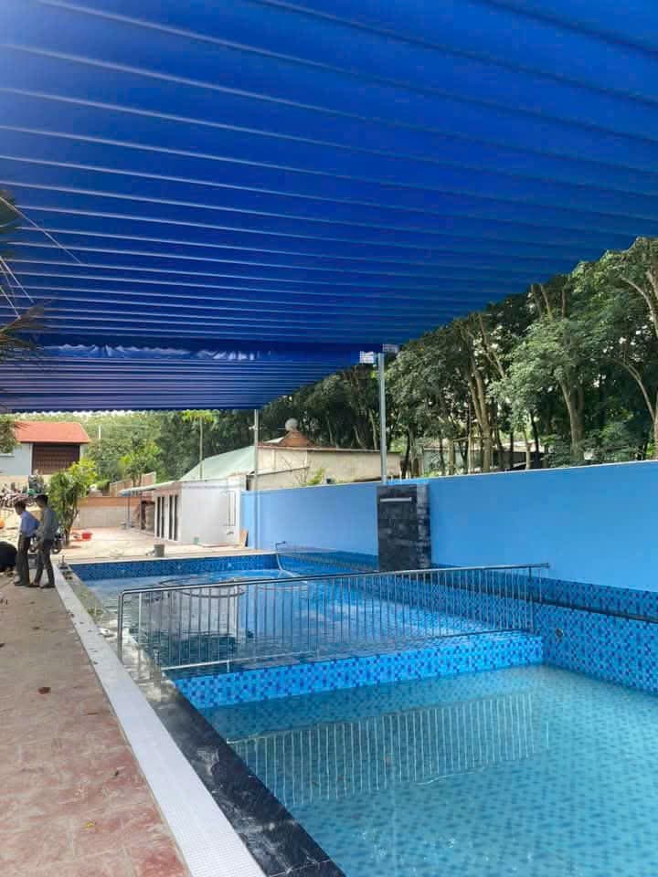 Mái Xếp Hồ Bơi Mái xếp che hồ bơi xanh dương tại TP.HCM